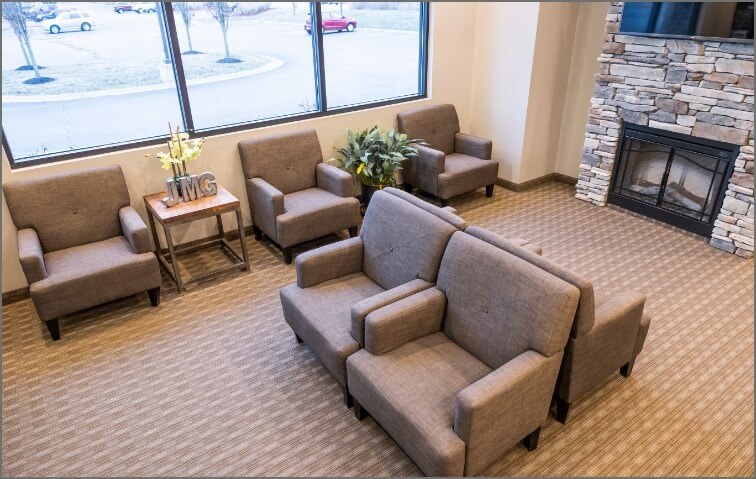 Seating and fire place in dental office waiting room