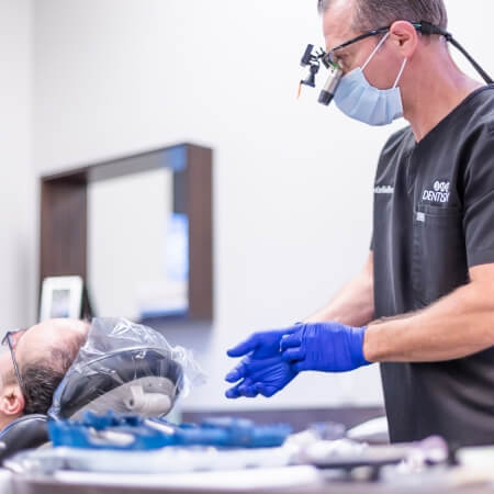 Dentist treating dental patient