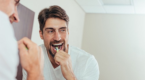 a person brushing their teeth
