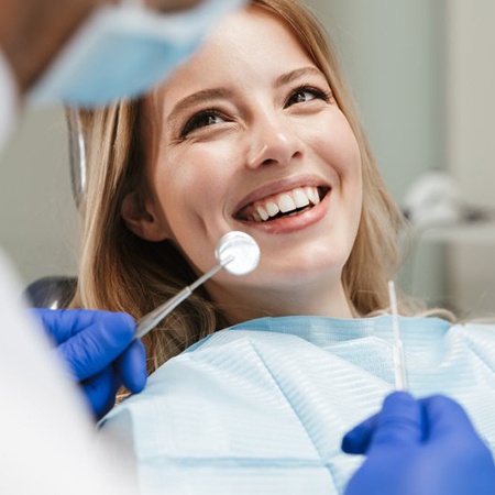 Patient smiles at dentist