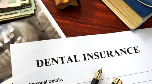 Dental insurance form on desk