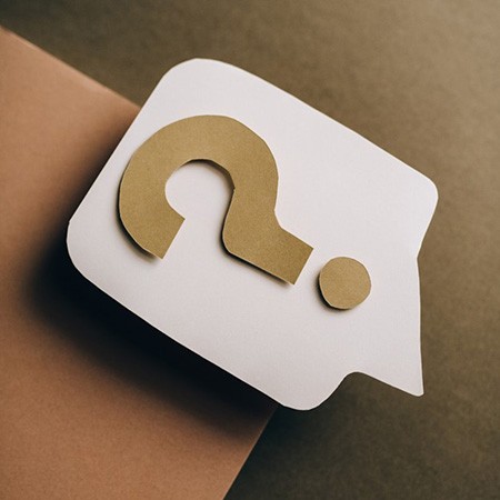 Question mark on paper card