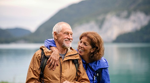 Couple smiling on hike