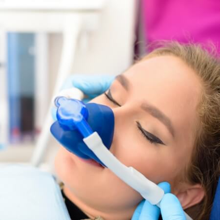 Dental patient receiving nitrous oxide sedation dentistry
